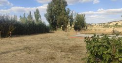 REF 25107- TERRENO CON CASA DE MADERA