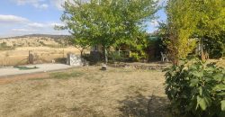 REF 25107- TERRENO CON CASA DE MADERA