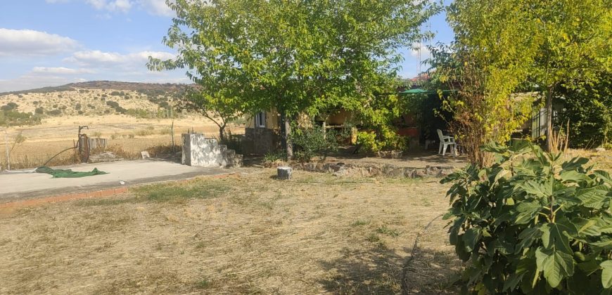 REF 25107- TERRENO CON CASA DE MADERA