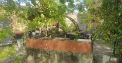 REF 25107- TERRENO CON CASA DE MADERA