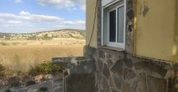 REF 25107- TERRENO CON CASA DE MADERA