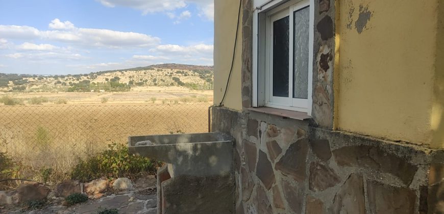 REF 25107- TERRENO CON CASA DE MADERA