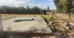 REF 25107- TERRENO CON CASA DE MADERA