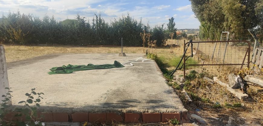 REF 25107- TERRENO CON CASA DE MADERA