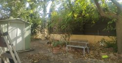 REF 25107- TERRENO CON CASA DE MADERA