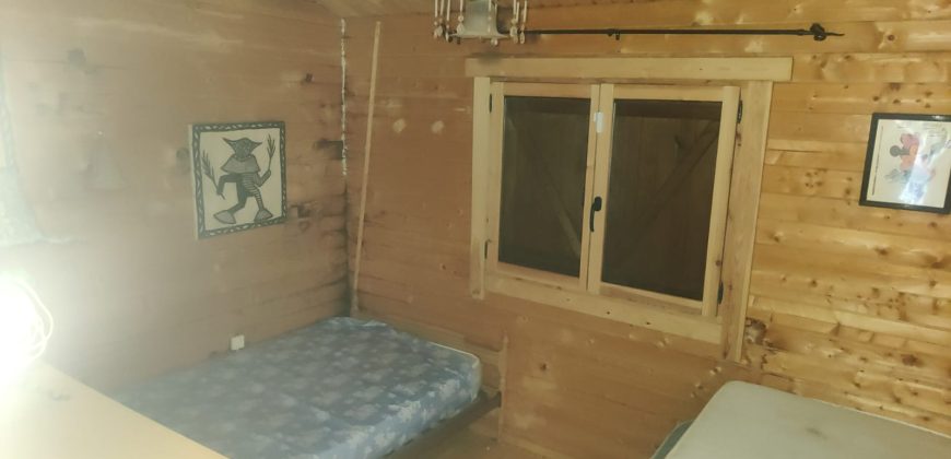 REF 25107- TERRENO CON CASA DE MADERA