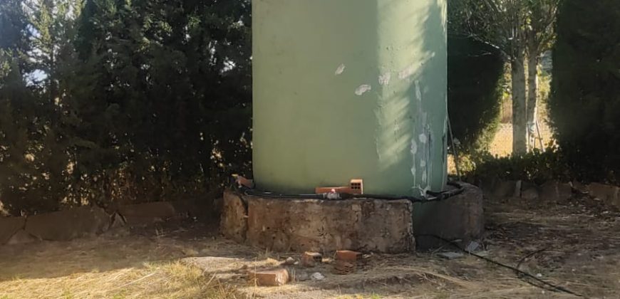 REF 25107- TERRENO CON CASA DE MADERA