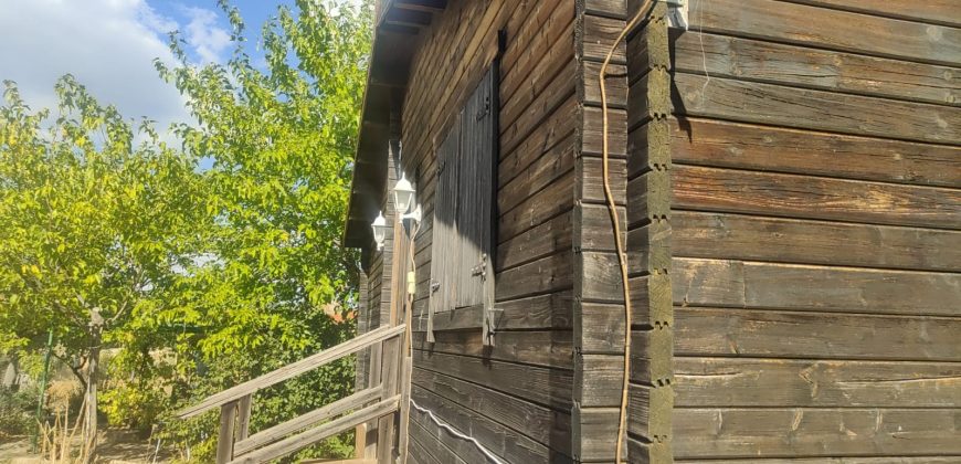 REF 25107- TERRENO CON CASA DE MADERA