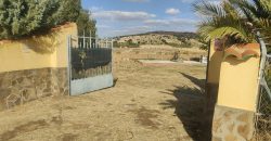 REF 25107- TERRENO CON CASA DE MADERA