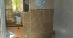 REF 25107- TERRENO CON CASA DE MADERA